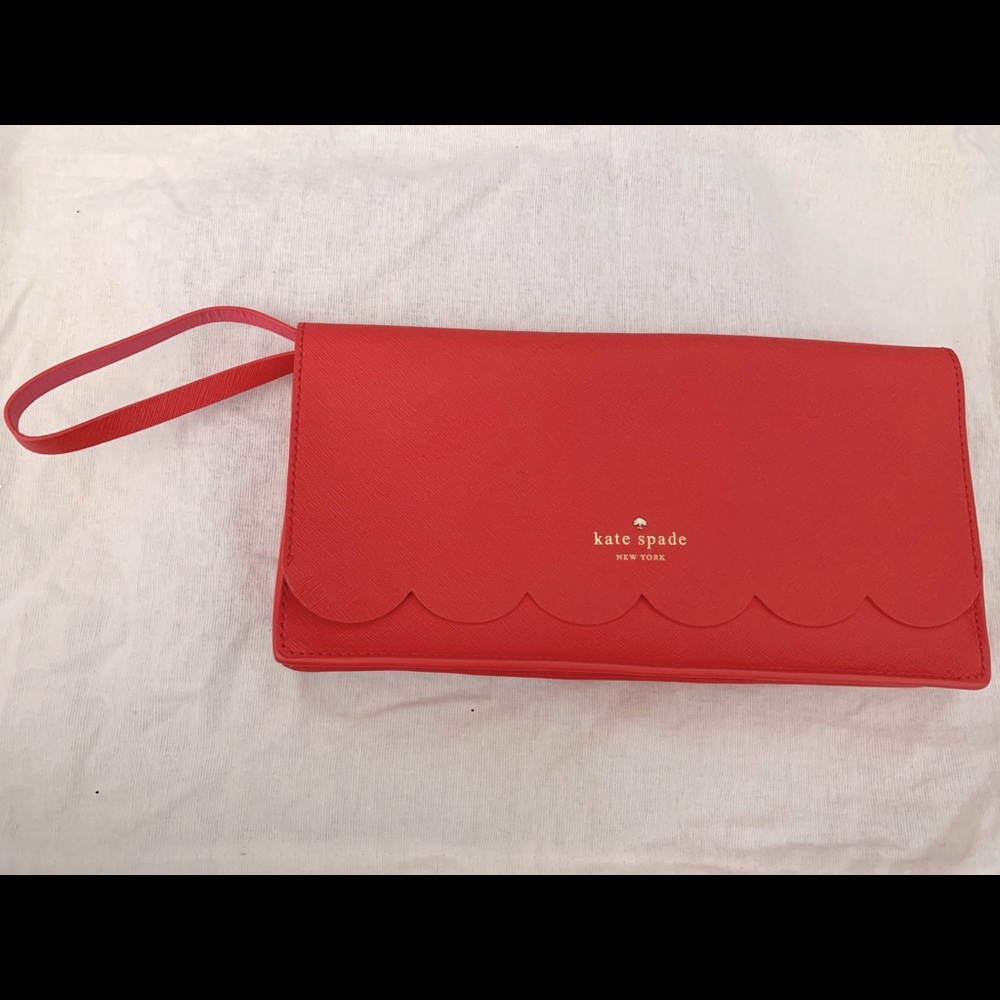Kate Spade coral scalloped clutch with wrist strap